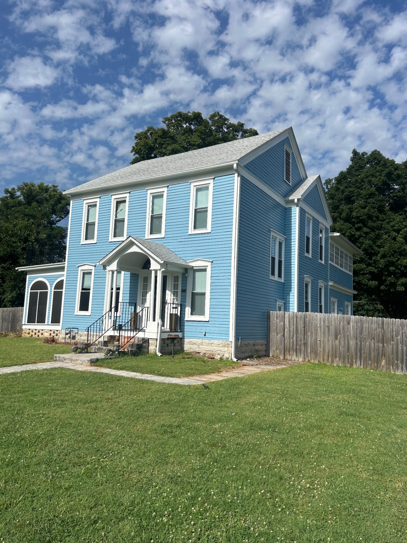 Home exterior after RNR 4 State Construction finished the siding and paint work